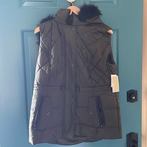 Brand New Michael Kors puffer vest in dark army green.